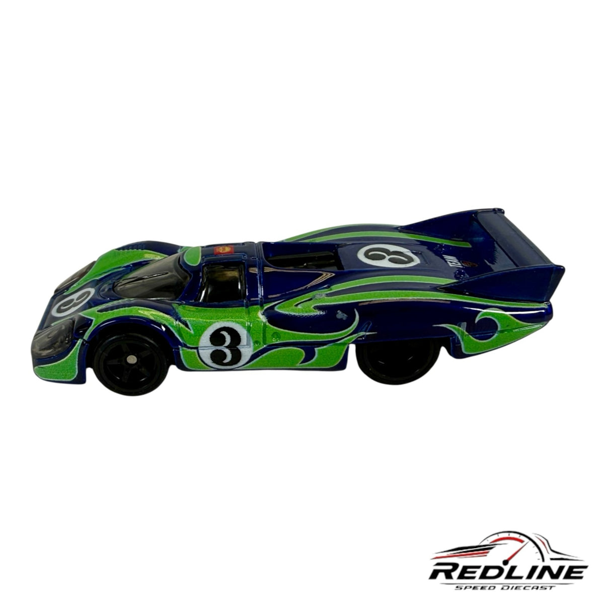 Redline Speed Diecast Porsche 917LH long-tail race car in deep blue with green flame graphics and number 3 livery.