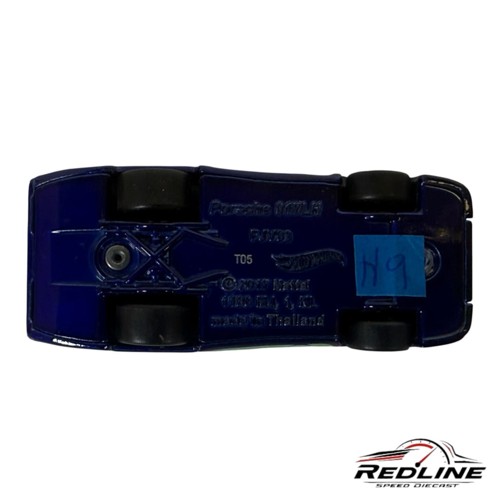 Underside of a Redline Speed Diecast Porsche 917LH model car in deep blue with visible chassis details