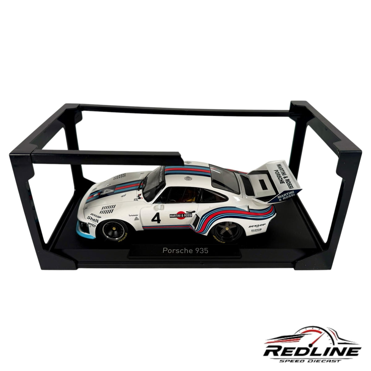 Redline Speed Diecast Porsche 935 Martini Racing model car in white with iconic livery on a black display stand
