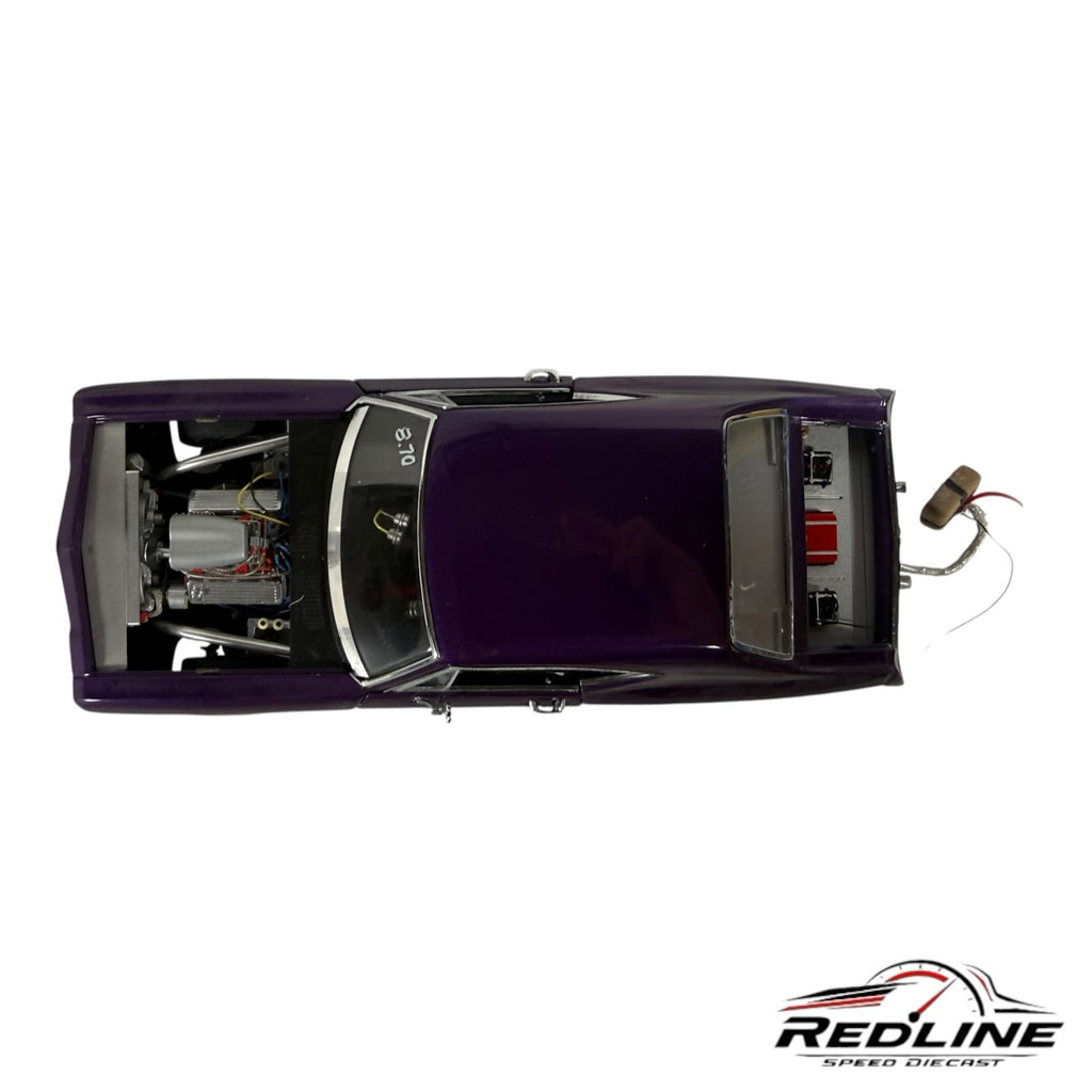 Top-down view of a Redline Speed Diecast 1968 purple Chevelle Pro Street model car with detailed engine and interior.