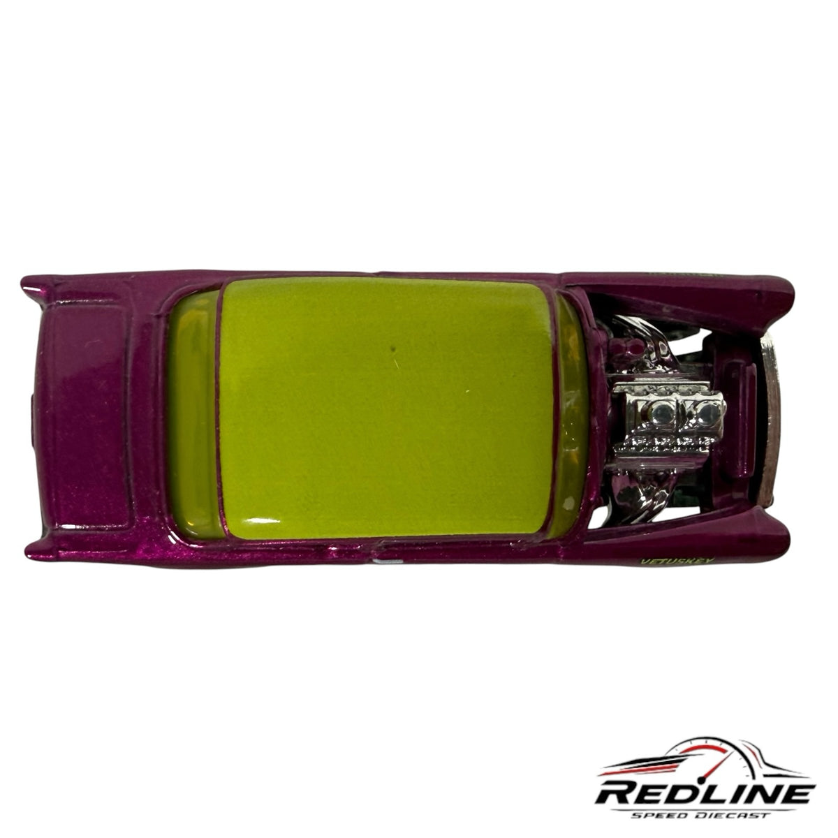 Redline Speed Diecast 1955 Chevy gasser model in metallic purple with a lime green roof and chrome engine top view