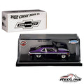 Redline Speed Diecast 1972 Chevy Nova SS muscle car in purple with Yenko branding, displayed in a clear acrylic case.