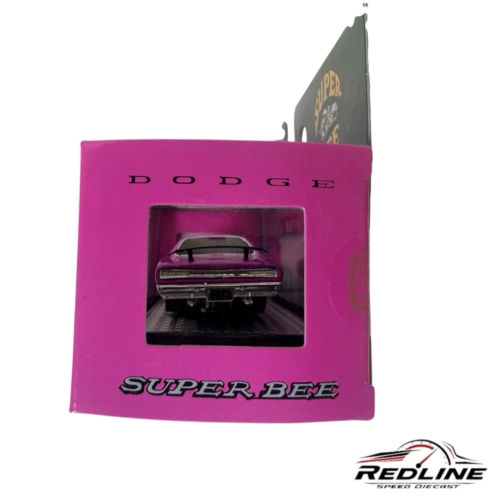Redline Speed Diecast 1970 Dodge Coronet Super Bee model car in purple, viewed from the rear in its display box.