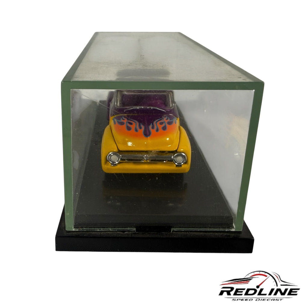 Redline Speed Diecast vintage purple and yellow pickup truck model with flame decals in a clear display case.