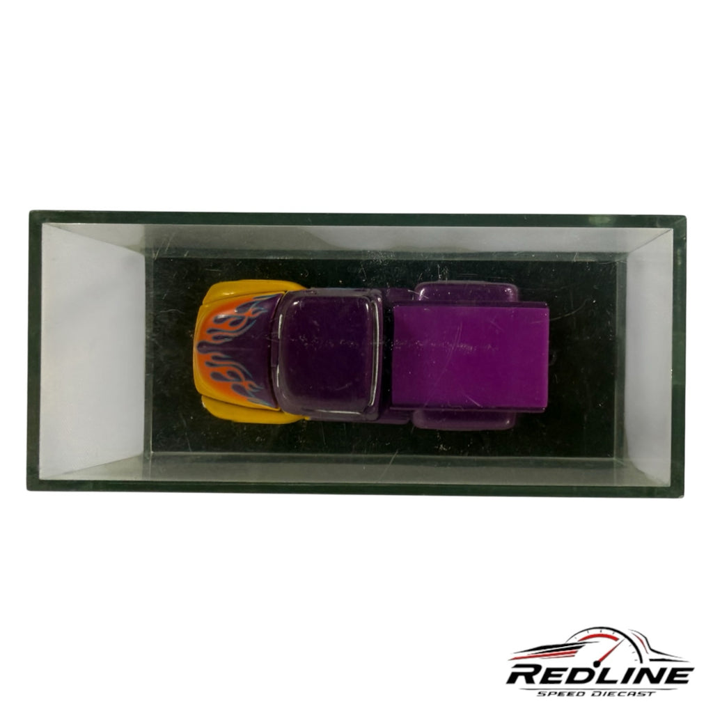 Redline Speed Diecast vintage purple and yellow pickup truck model with flame decals in a clear display case