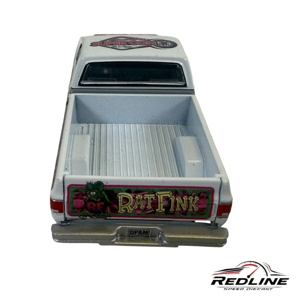 Redline Speed Diecast Rat Fink custom pickup truck model in white with vibrant green and pink tailgate graphics