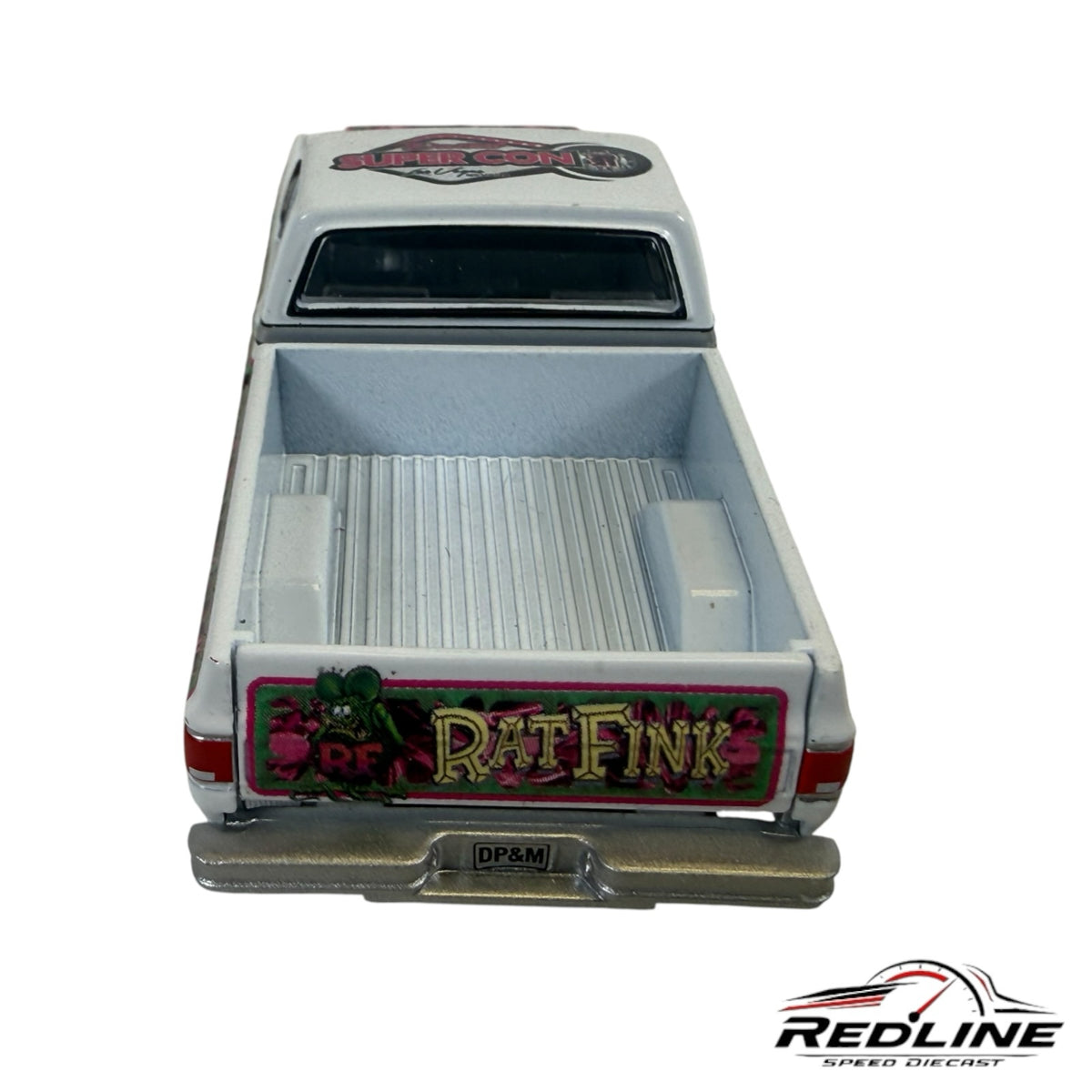 Redline Speed Diecast Rat Fink custom pickup truck model in white with vibrant green and pink tailgate graphics