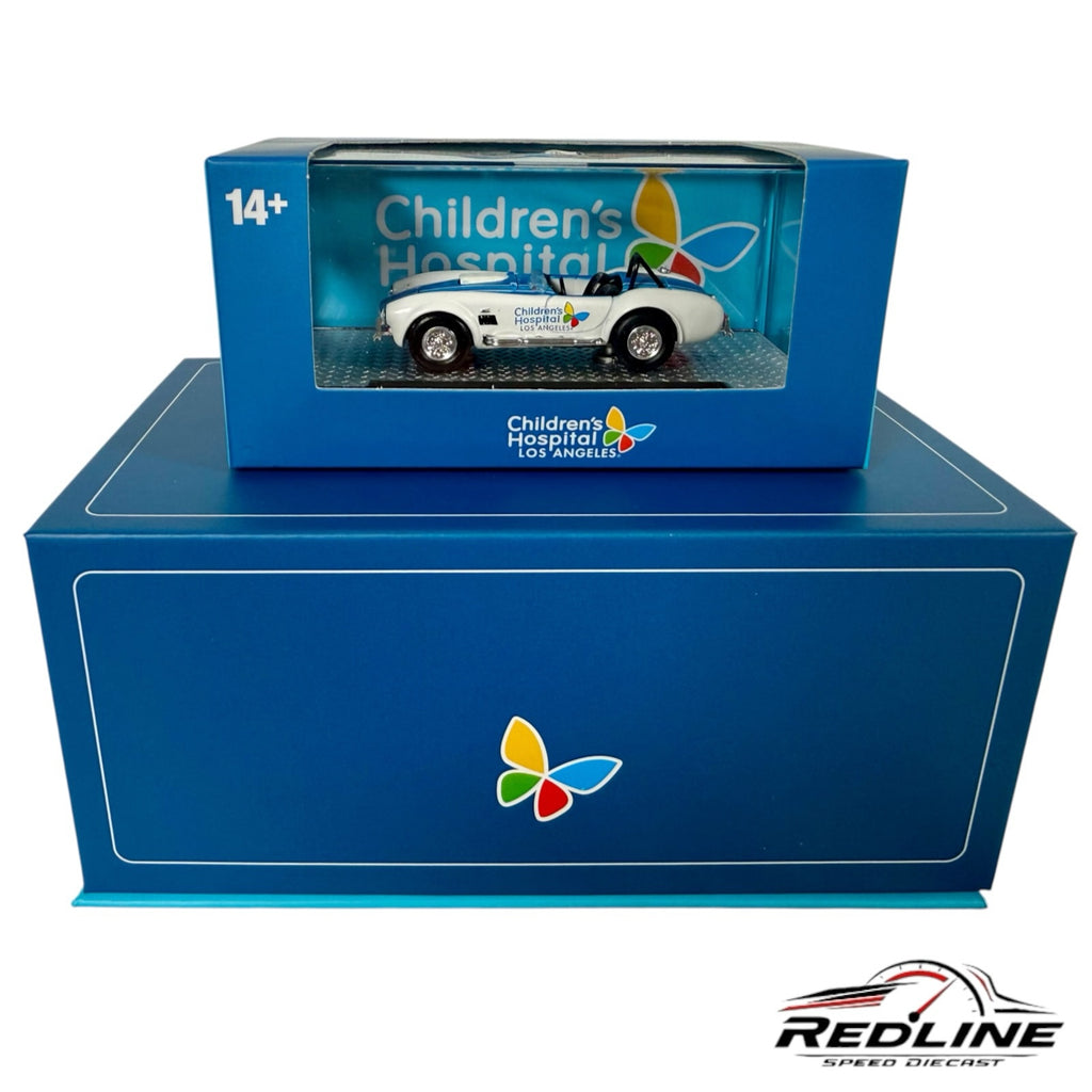 Redline Speed Diecast 1:64 scale 1965 Shelby Cobra model in white and blue with Children's Hospital Los Angeles livery
