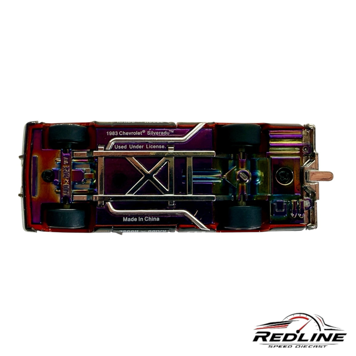 Redline Speed Diecast 1983 Chevrolet Silverado model showing the iridescent metal chassis and detailed undercarriage