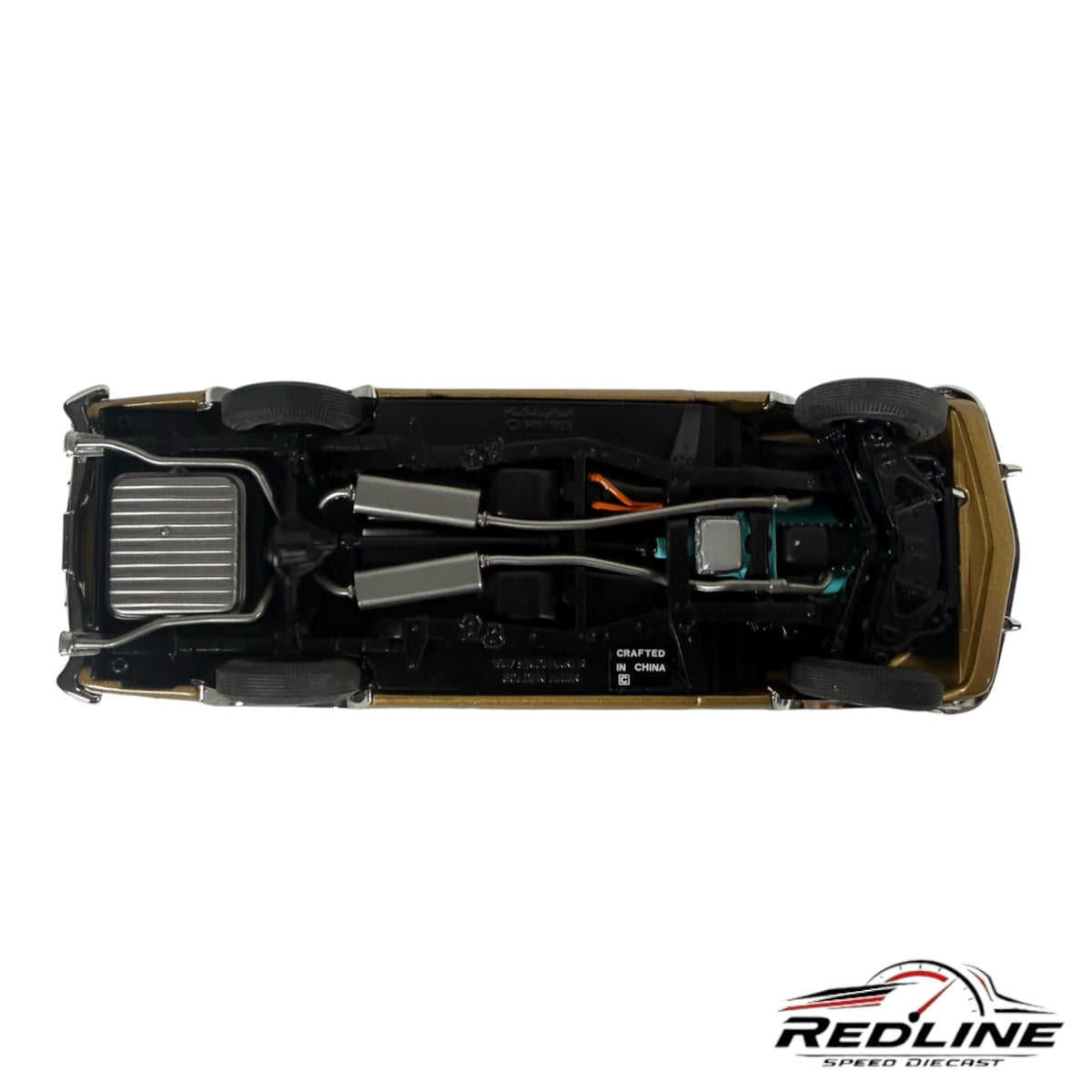 Underside view of a Redline Speed Diecast 1957 Studebaker Golden Hawk model car showing chassis and exhaust details.