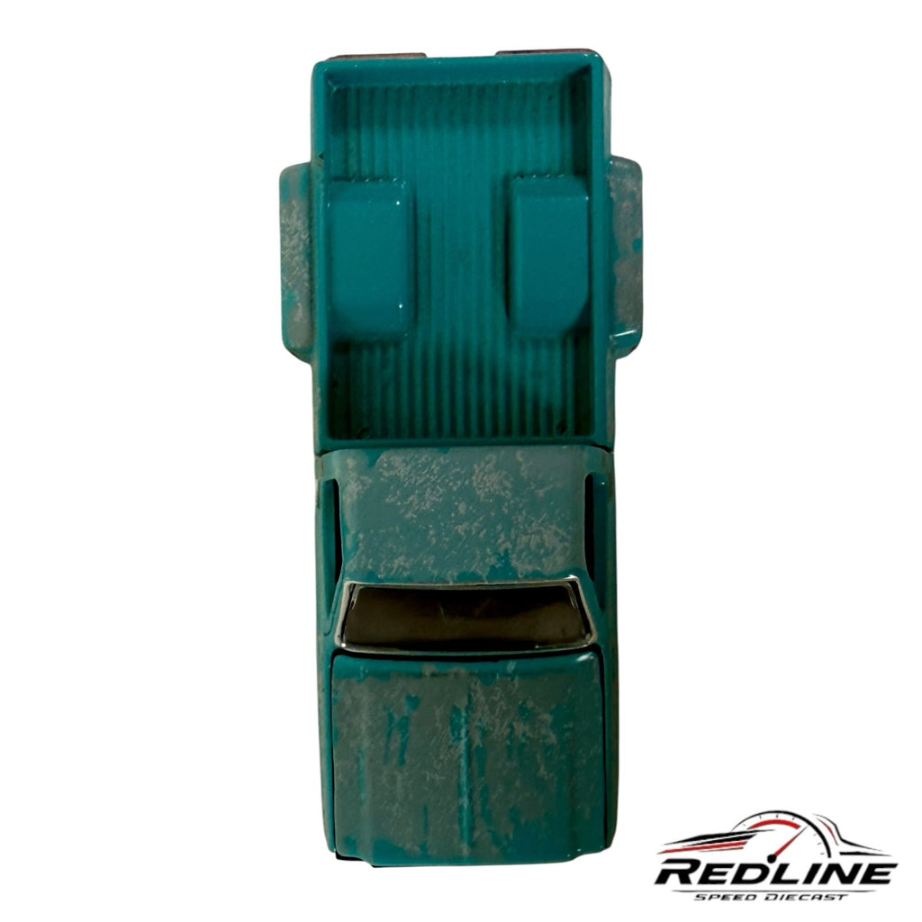 Redline Speed Diecast 1978 Chevrolet pickup truck model in distressed teal with a weathered finish, top-down view.
