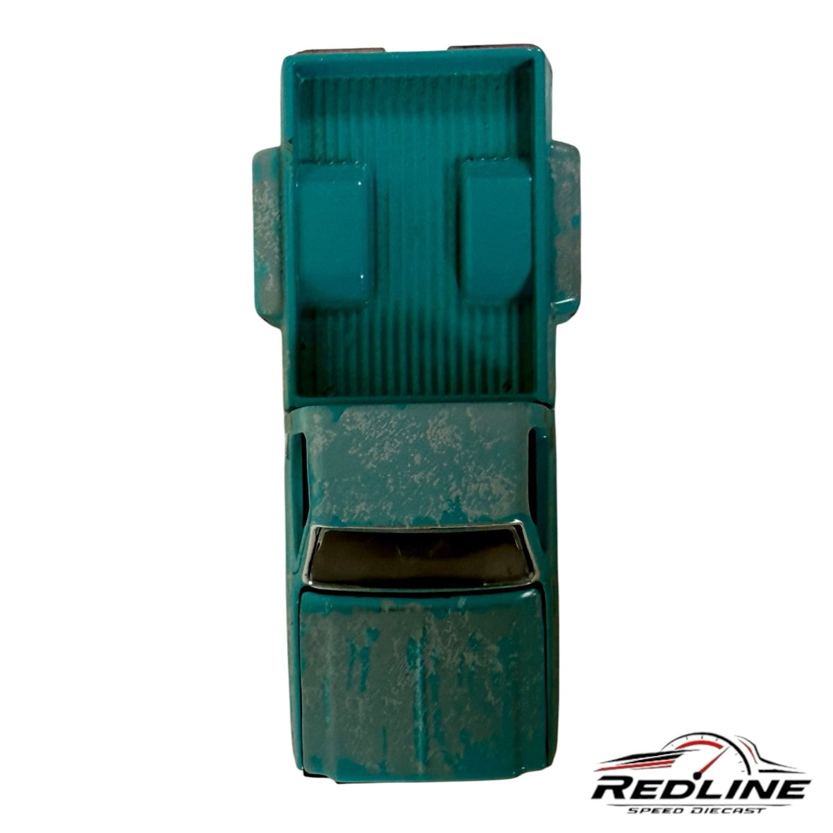 Redline Speed Diecast 1978 Chevrolet pickup truck model in distressed teal with a weathered finish, top-down view.