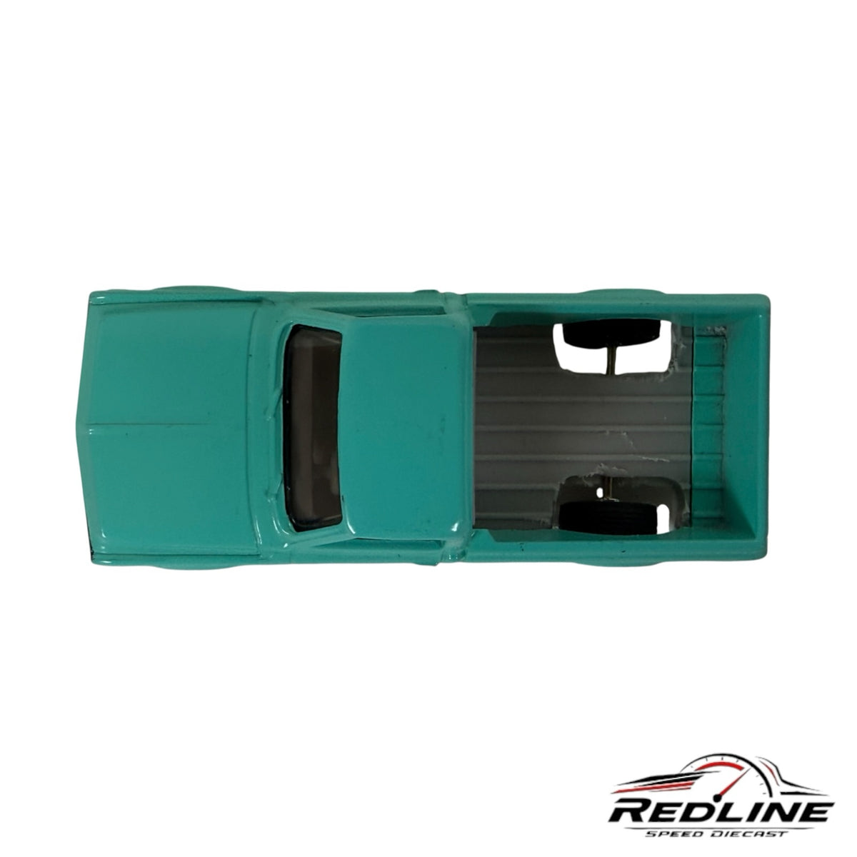 Redline Speed Diecast 1968 Chevy C10 pickup truck model in vibrant teal, viewed from a top-down perspective.