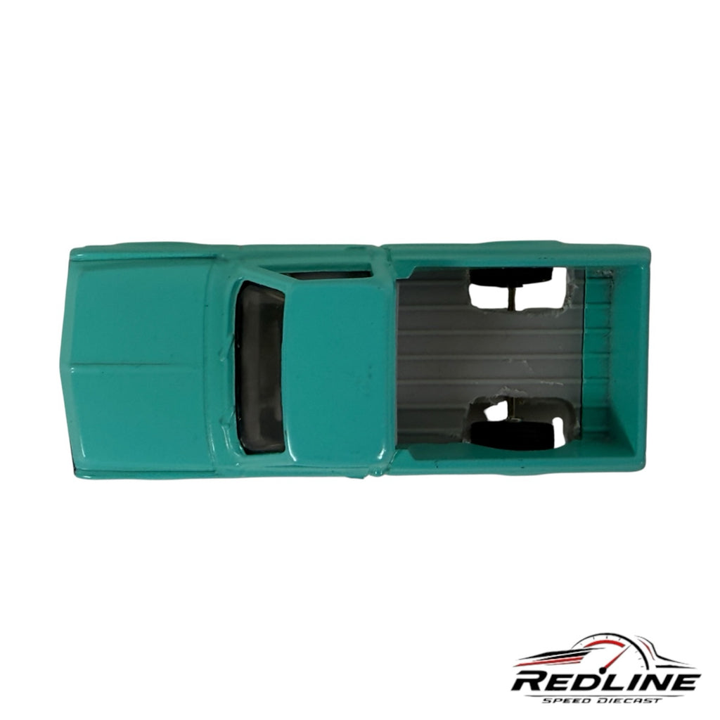 Top view of a Redline Speed Diecast 1968 Chevy C10 pickup truck model in vibrant teal with a grey truck bed.