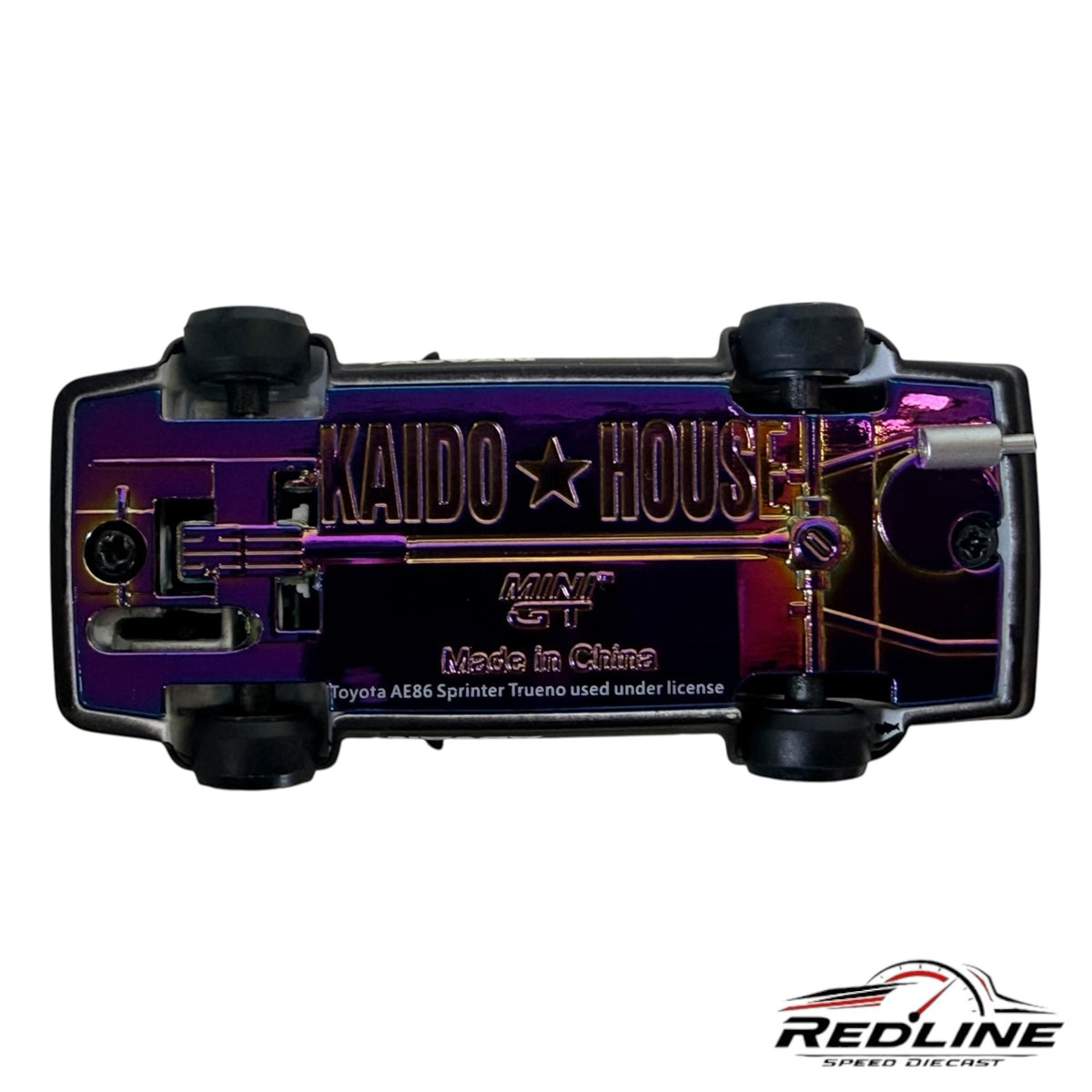 Redline Speed Diecast Toyota Sprinter Trueno AE86 model showing the unique iridescent purple underside chassis detail