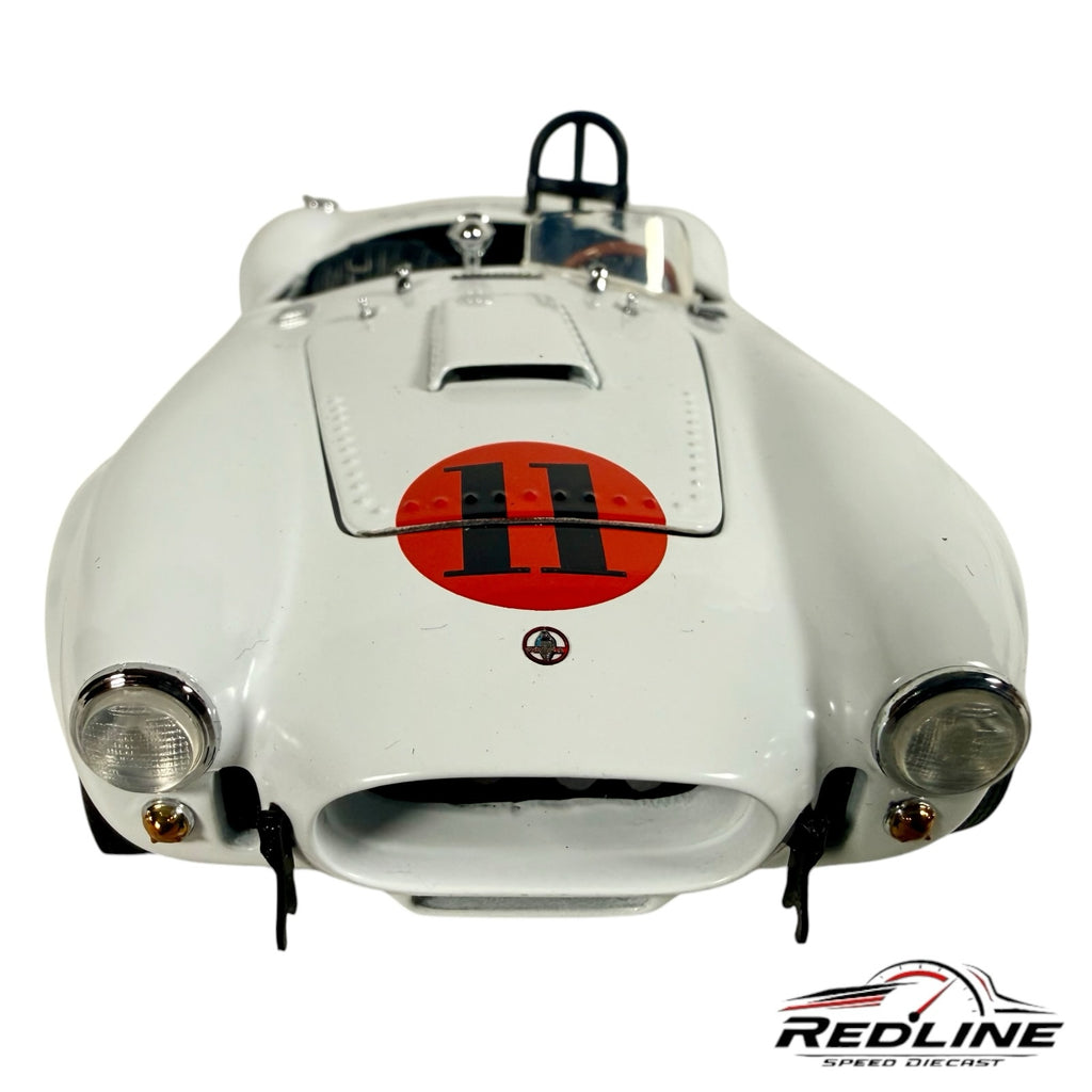 Redline Speed Diecast 1:24 scale white Shelby Cobra model car with red number 11 racing decal and roll bar
