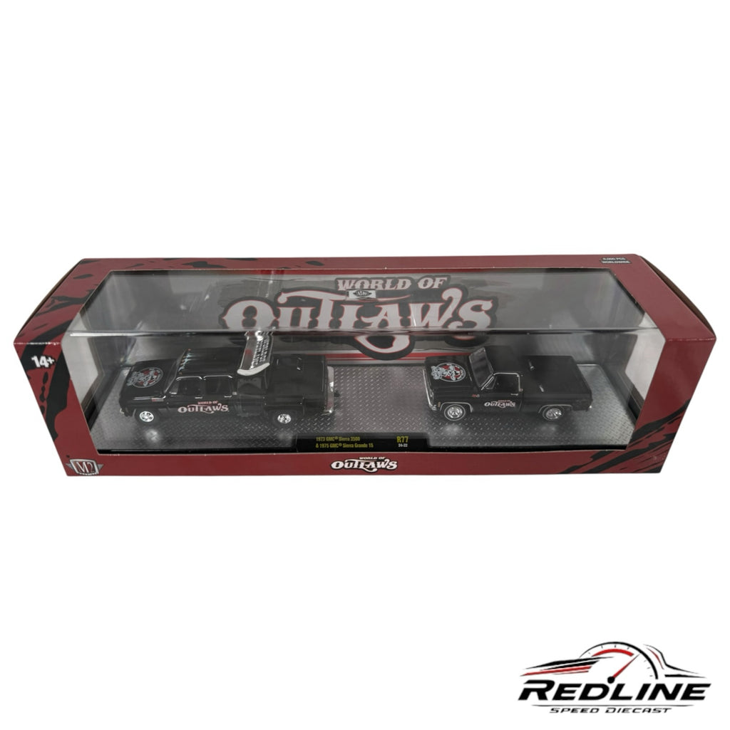 Redline Speed Diecast World of Outlaws two-piece black GMC truck set in a collector display box.