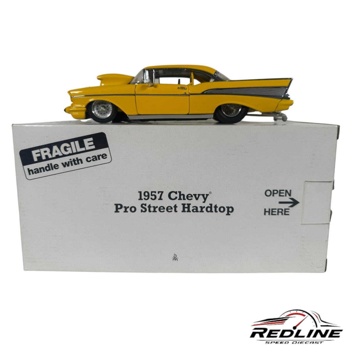 Redline Speed Diecast 1957 Chevrolet Pro Street Hardtop model car in vibrant yellow with wide rear tires on its box.