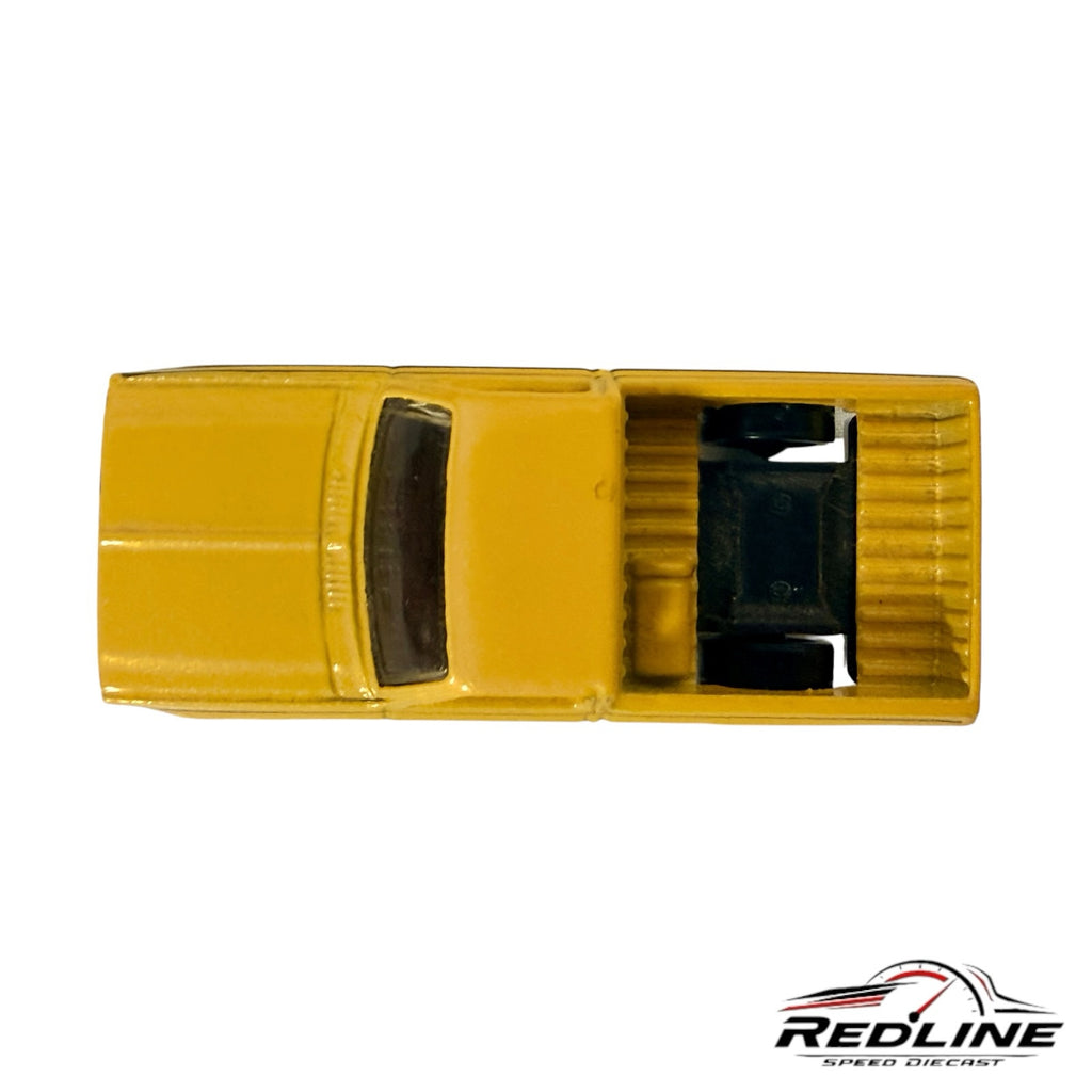 Redline Speed Diecast 1983 Chevy Silverado pickup truck in yellow, viewed from directly above.