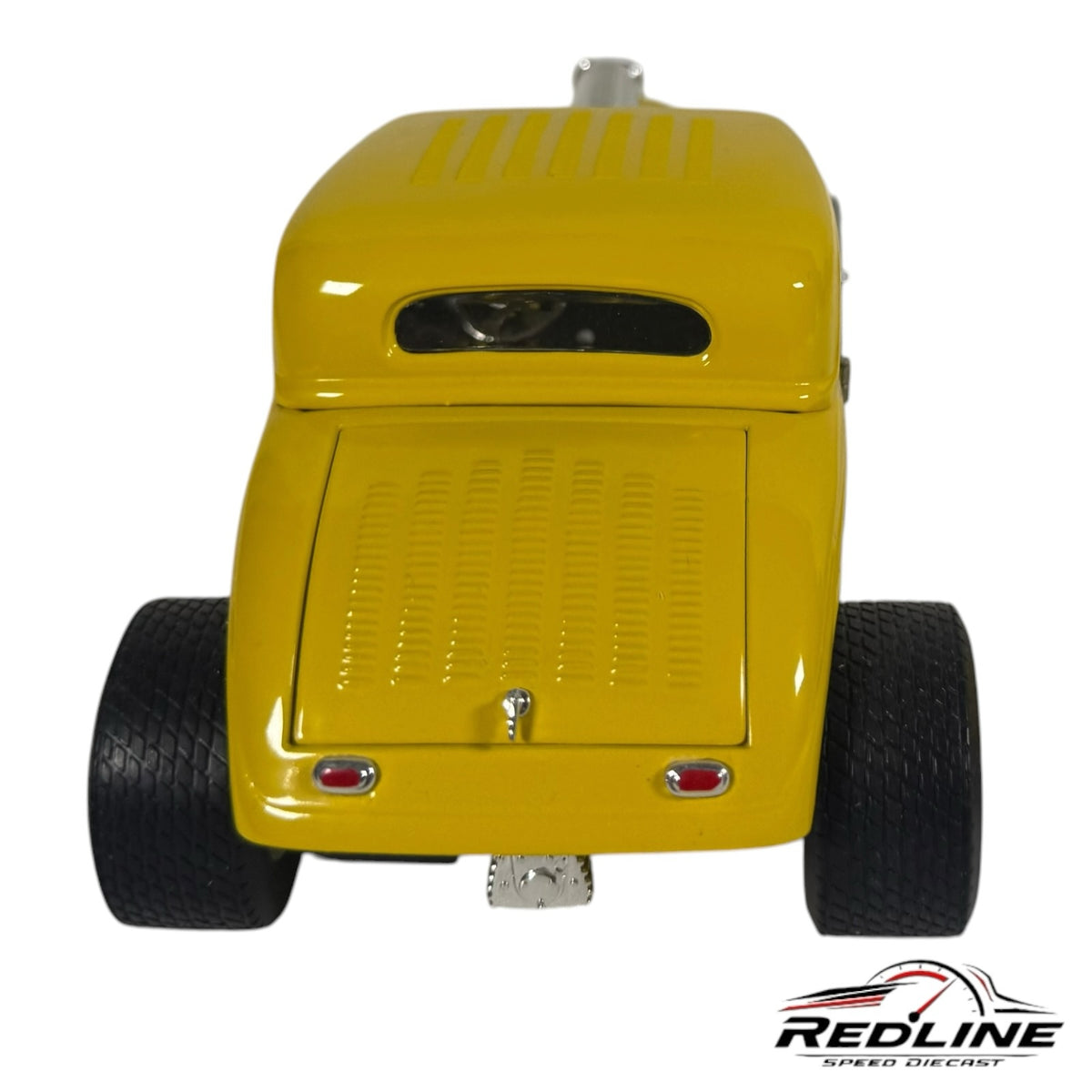 Redline Speed Diecast yellow 1934 Ford hot rod model car viewed from the rear showing wide tires and chrome details