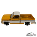 Redline Speed Diecast 1970s Chevrolet Cheyenne pickup truck model in two-tone yellow and white with custom wheels