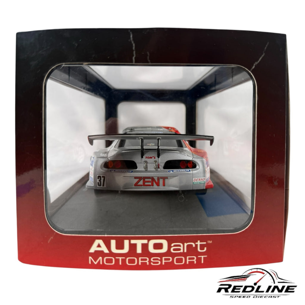 Redline Speed Diecast 1:18 scale AUTOart 2003 Zent Tom's Toyota Supra race car model in display packaging, rear view.