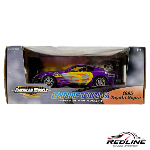 1:18 scale purple 1995 Toyota Supra diecast drift car model in original packaging with yellow and orange graphics.